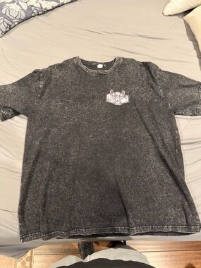 Men's Washed Black Crewneck Sweater with Small Chest Graphic